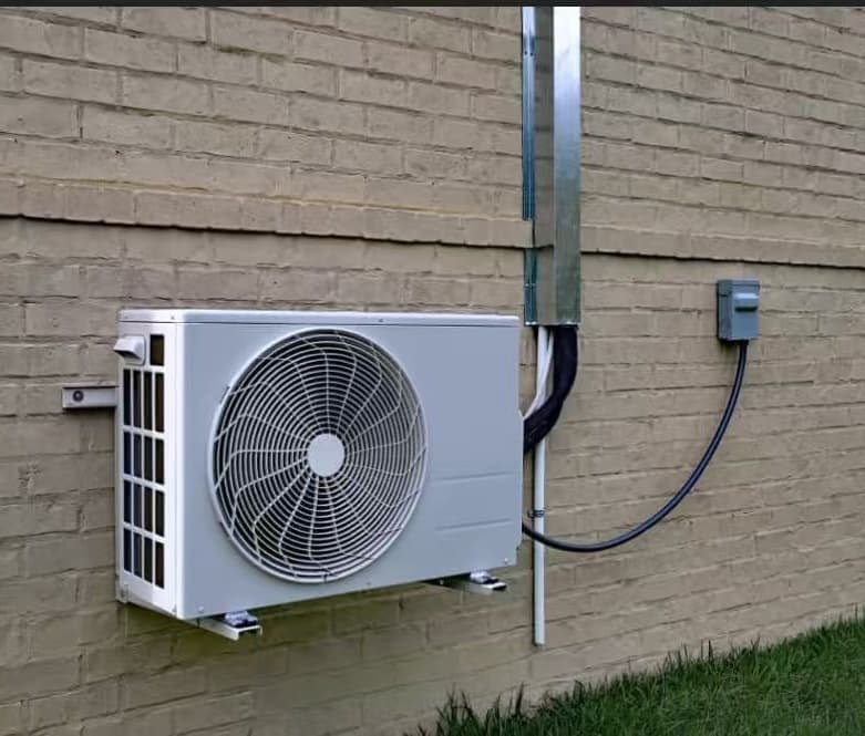 Typical AC Disconnect installation near outdoor condenser